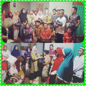 Poto bersama warga Selagan Raya sekaligus penyerahan bantuan sembako oleh Ibuk Hj. Yulia Susanti. SH. MH